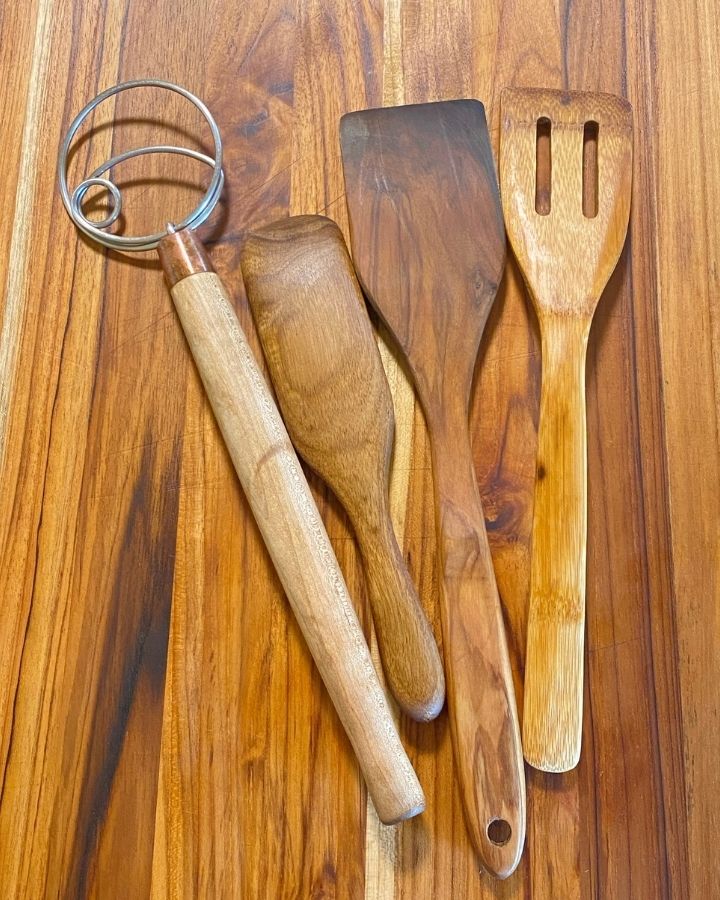 reconditioned cutting board and wooden spoons