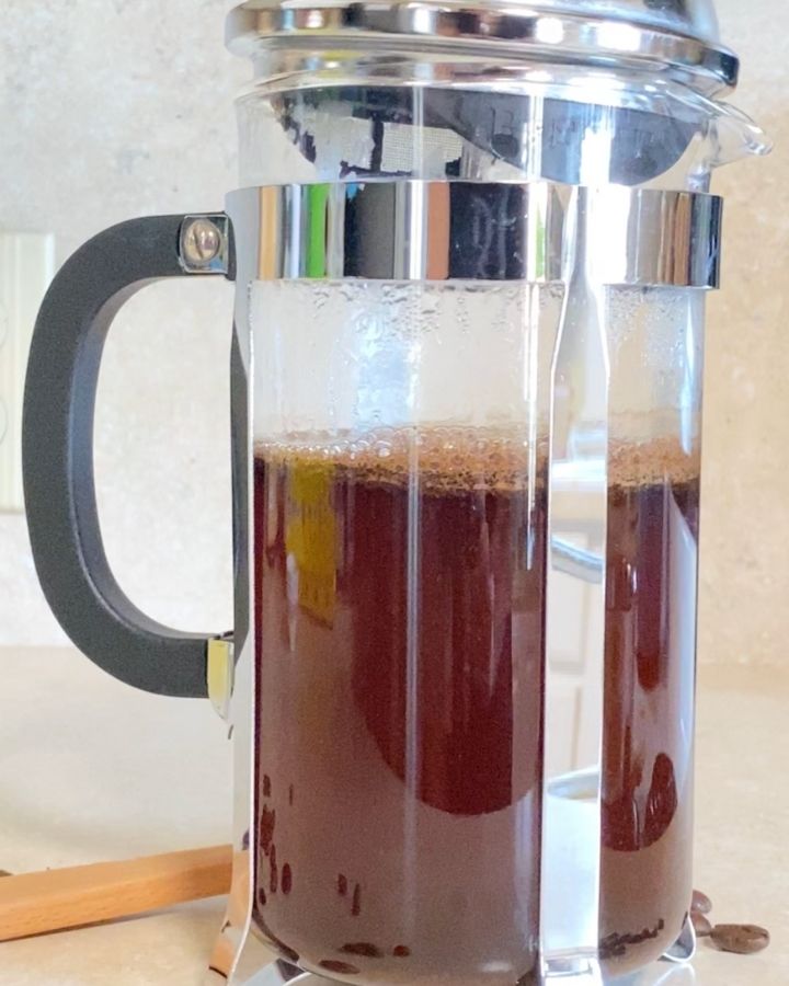 Brewing coffee in a french press.